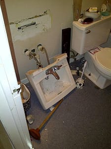 Sink torn off the bathroom wall