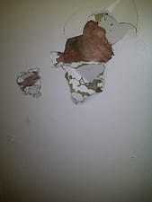 Hole in wall made by a tenant